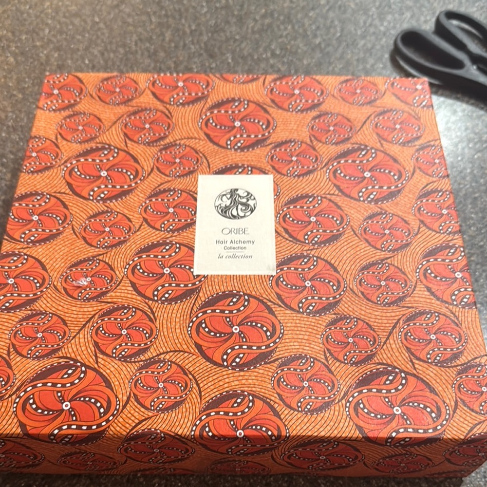 Oribe Hair Alchemy Box with Orange and Red Pattern